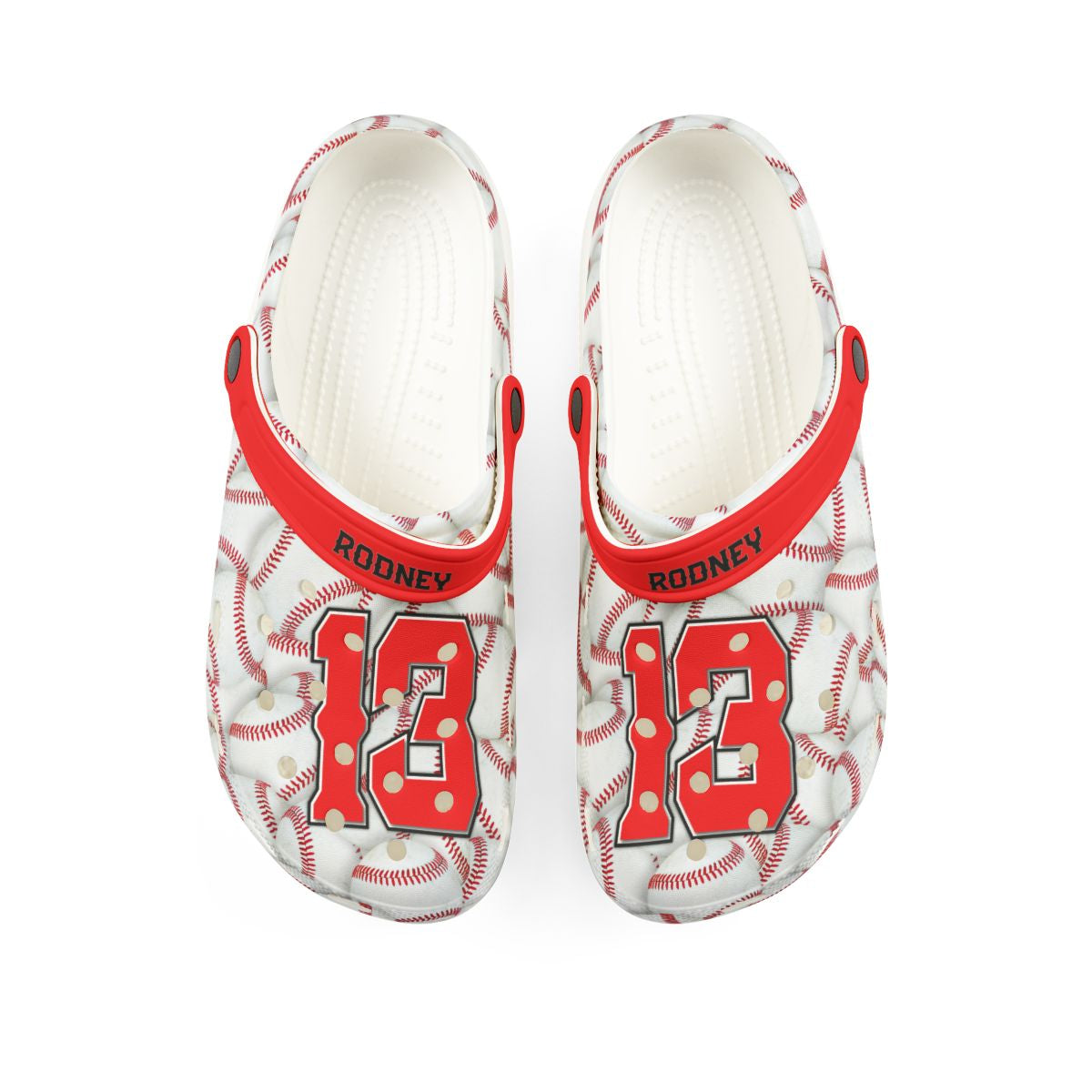 White sandals with red and black design on a white background